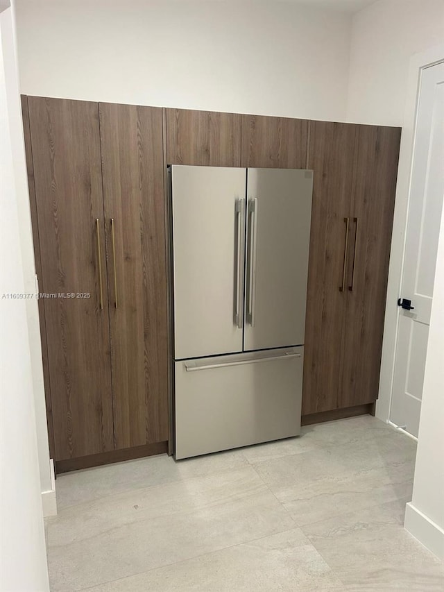 interior space featuring high end fridge