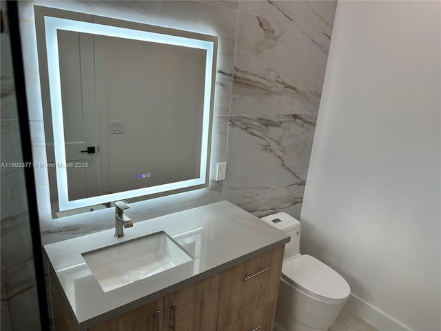 12231 SW 2nd St, Plantation, FL 33325 - bathroom with vanity, toilet, tile walls, and baseboards