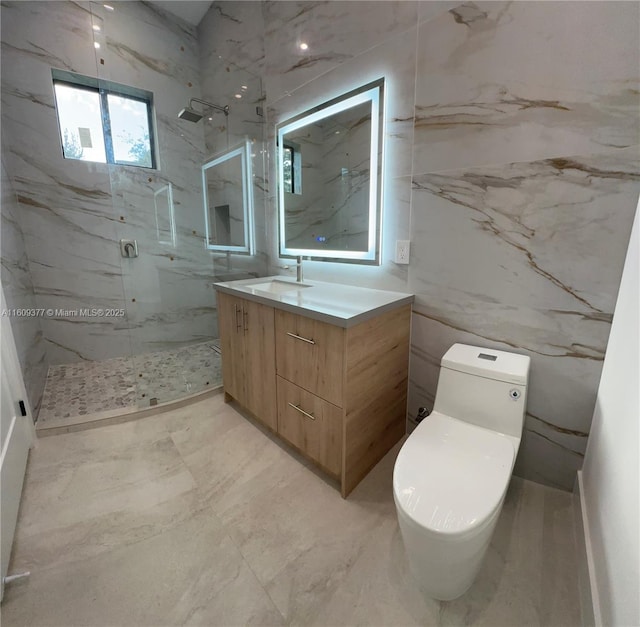 12231 SW 2nd St, Plantation, FL 33325 - bathroom with a marble finish shower, vanity, toilet, tile walls, and marble finish floors