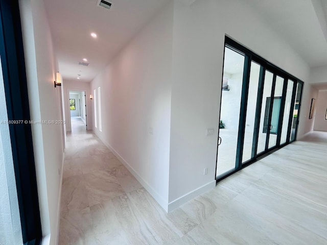 12231 SW 2nd St, Plantation, FL 33325 - hallway with recessed lighting, light marble finish floors, and baseboards