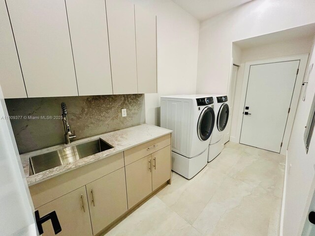 12231 SW 2nd St, Plantation, FL 33325 - laundry room featuring washer and clothes dryer and cabinet space