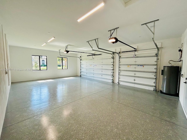 12231 SW 2nd St, Plantation, FL 33325 - garage with water heater and a garage door opener