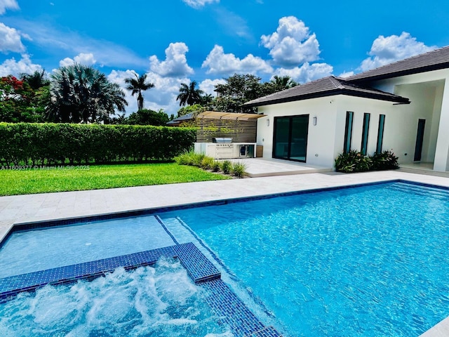 12231 SW 2nd St, Plantation, FL 33325 - view of swimming pool featuring area for grilling, a pool with connected hot tub, and a patio