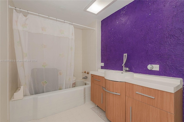 bathroom featuring vanity, shower / tub combo with curtain, and tile patterned floors