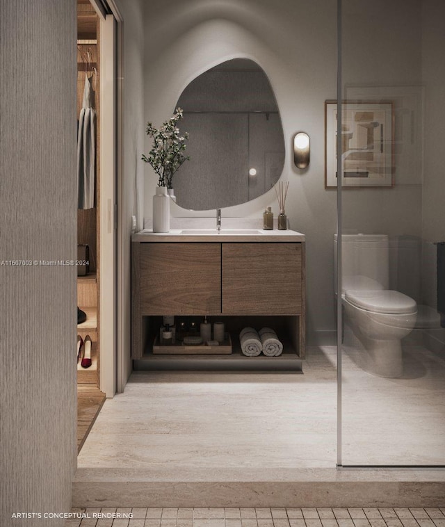 bathroom featuring vanity, toilet, and hardwood / wood-style floors