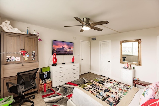 bedroom featuring ceiling fan and light hardwood / wood-style floors