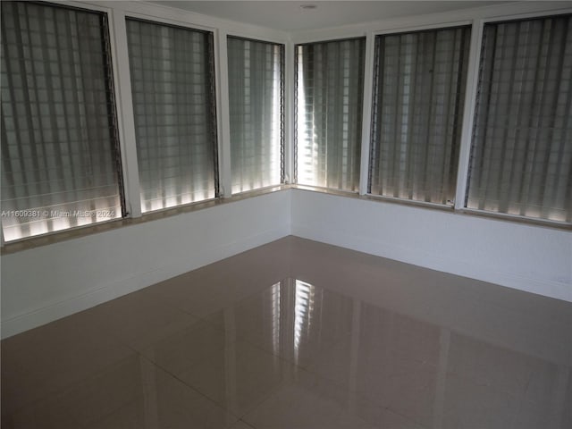 view of tiled empty room