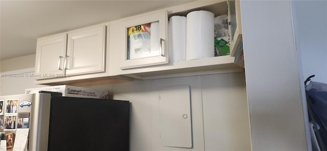 interior details with stainless steel fridge