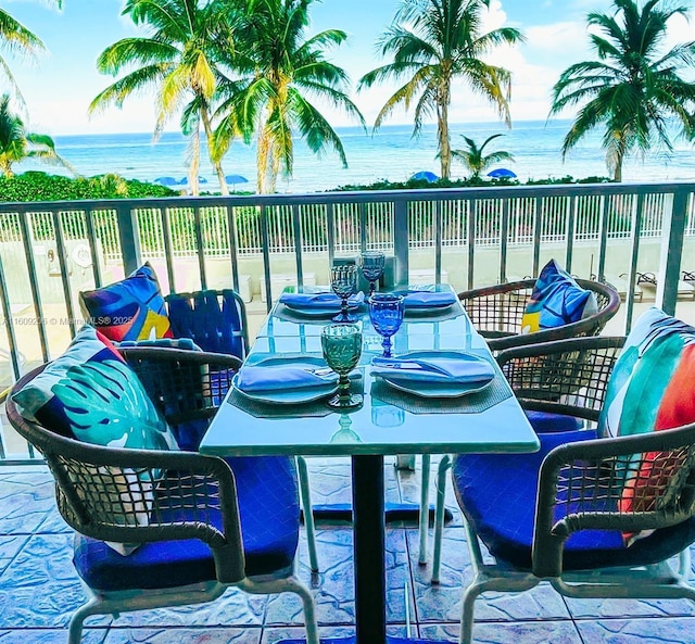 balcony featuring a water view