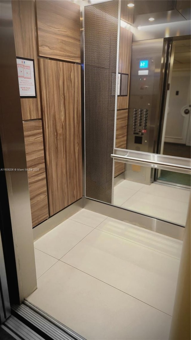 interior space featuring light tile patterned floors