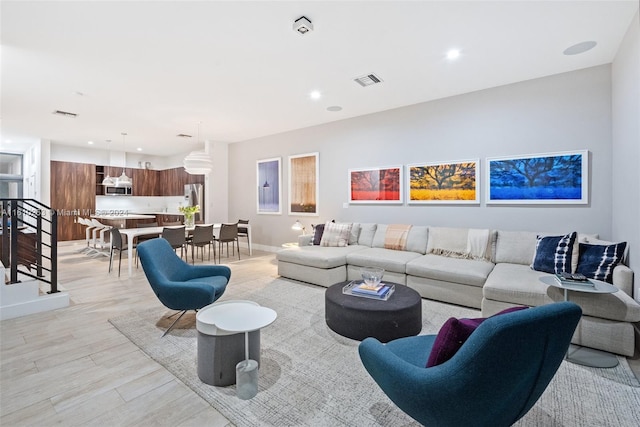 living room featuring light hardwood / wood-style flooring