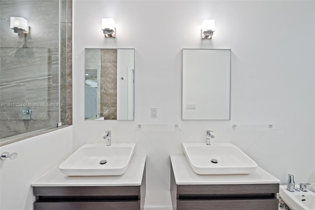 bathroom featuring a bidet, vanity, and walk in shower