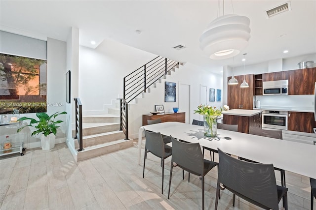 dining area featuring light hardwood / wood-style floors