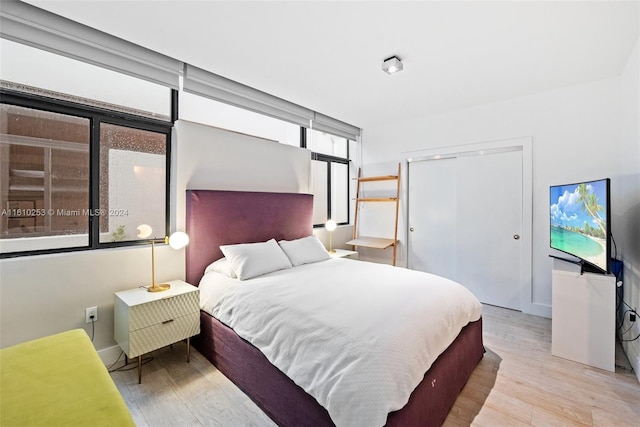 bedroom featuring light hardwood / wood-style floors