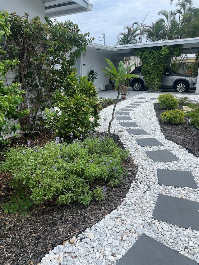 view of yard with a carport