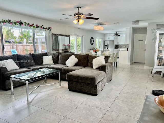 living room with light tile patterned flooring