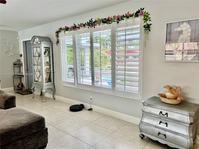 sitting room with light tile patterned floors