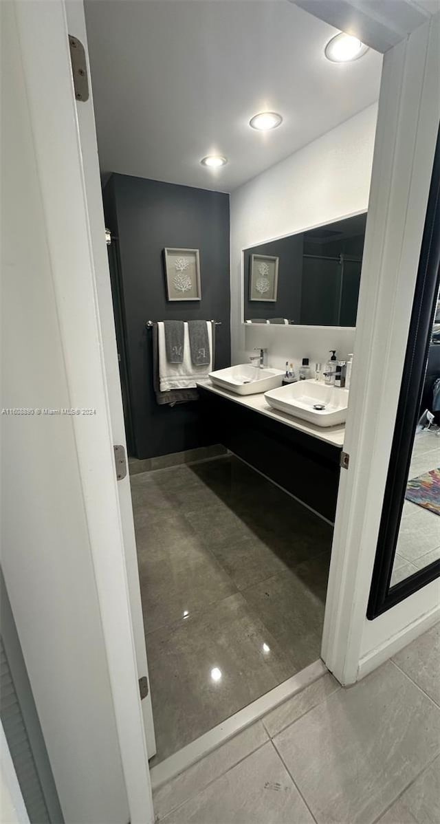 330 Poinciana Dr Unit 1002, Sunny Isles Beach, FL 33160 - bathroom featuring double vanity