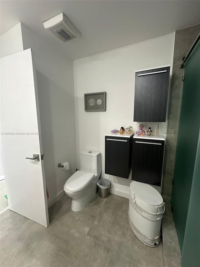 330 Poinciana Dr Unit 1002, Sunny Isles Beach, FL 33160 - bathroom with toilet and a sink