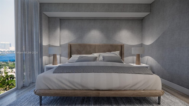 bedroom with wood-type flooring