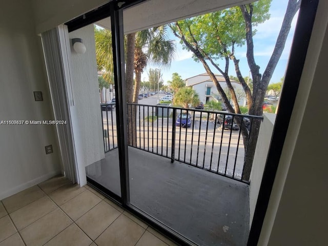 doorway featuring tile flooring