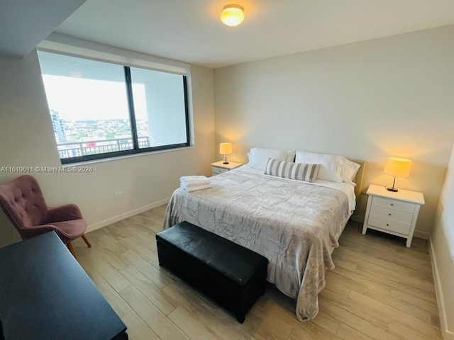 bedroom featuring light wood-type flooring