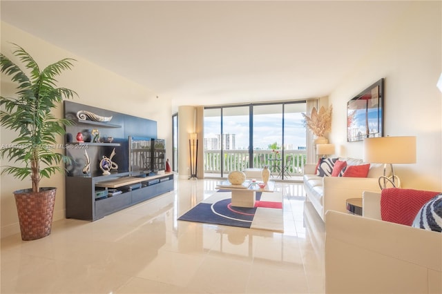 tiled living room featuring floor to ceiling windows