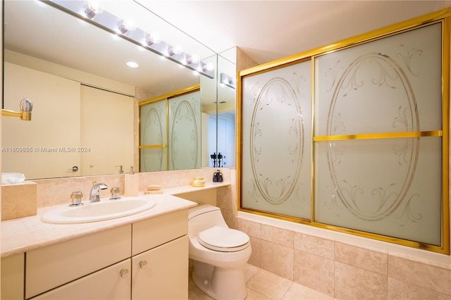 full bathroom with vanity, toilet, shower / bath combination with glass door, and tile patterned flooring