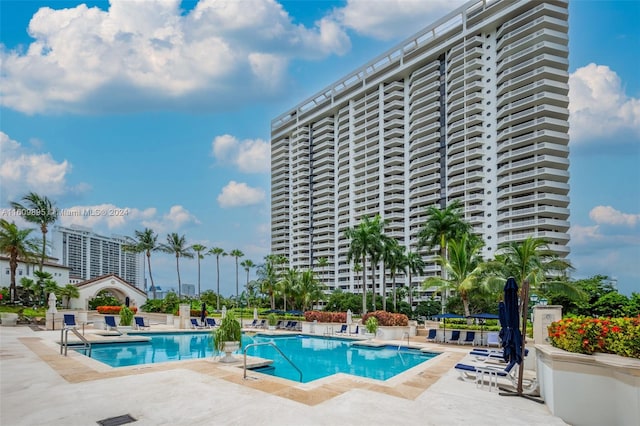 view of swimming pool featuring a patio area