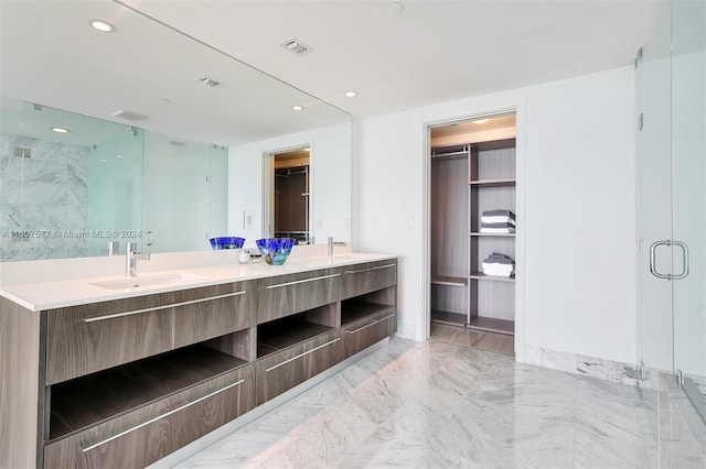 bathroom featuring vanity and walk in shower