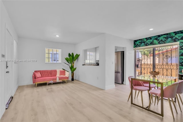 dining room featuring light wood-type flooring