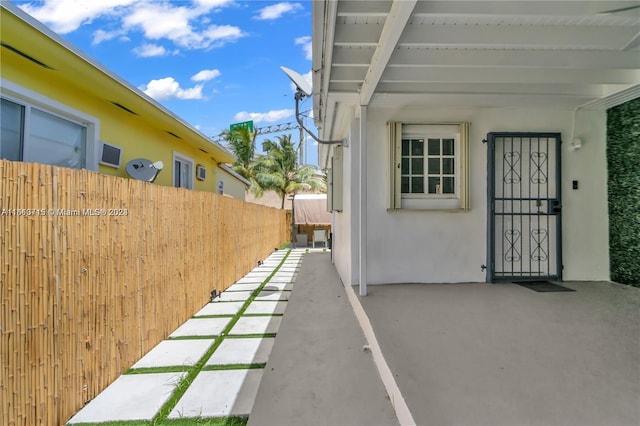 view of property exterior with a patio