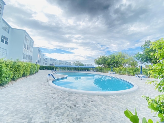 view of pool with a patio