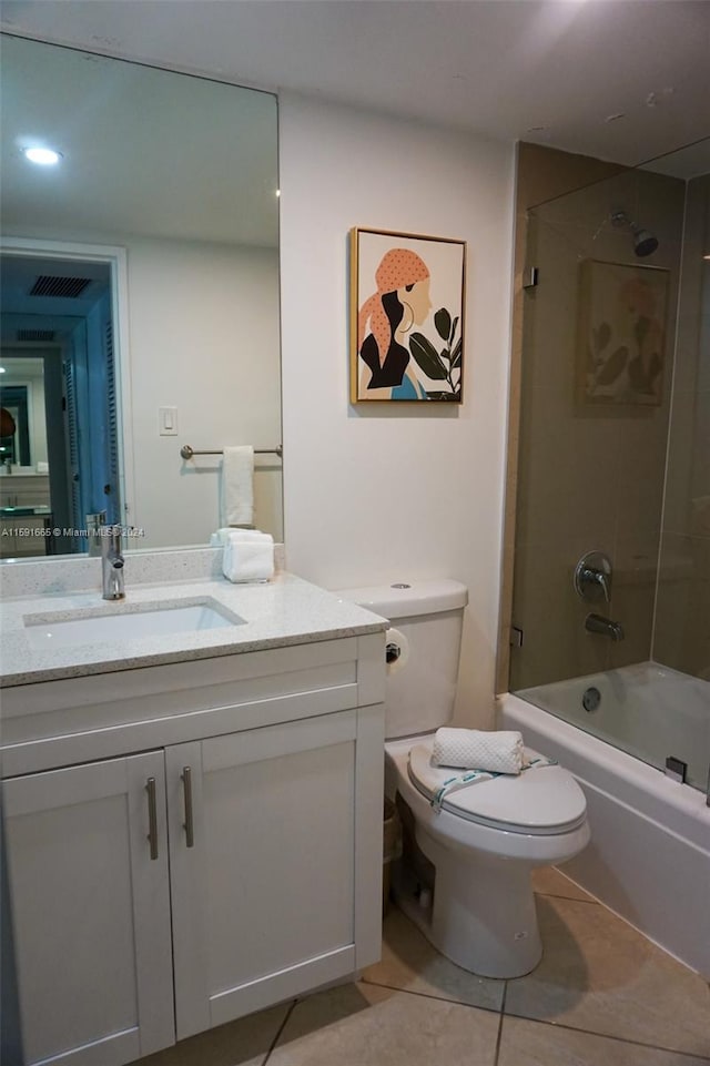 full bathroom featuring tile patterned flooring, vanity, toilet, and bathtub / shower combination