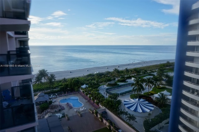 property view of water featuring a beach view