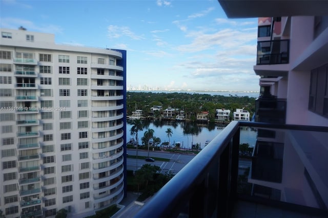 balcony featuring a water view