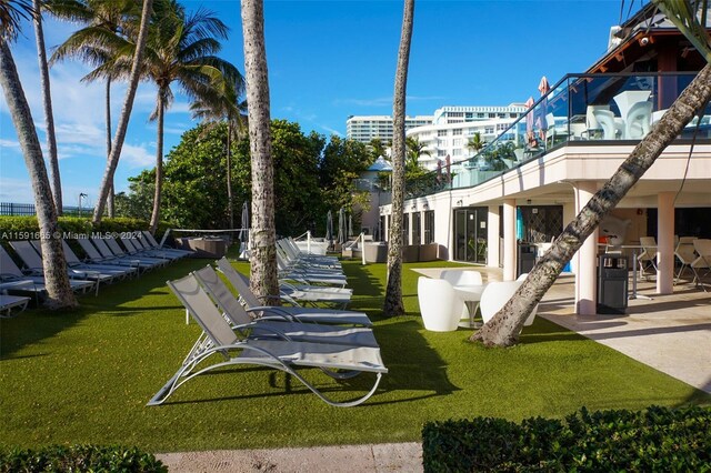 surrounding community featuring a lawn