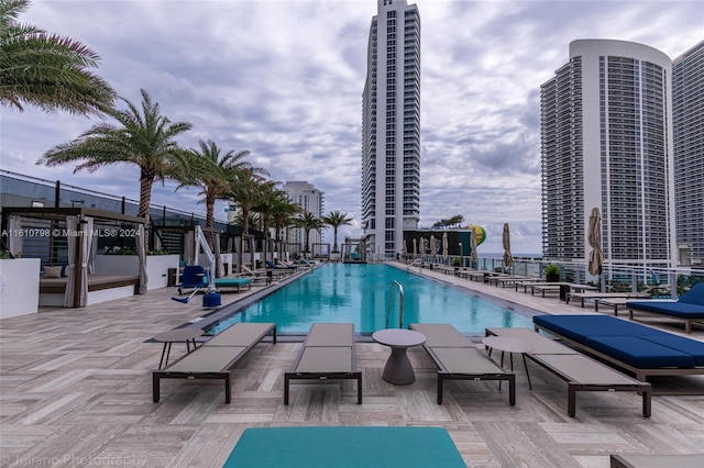 view of swimming pool with a patio