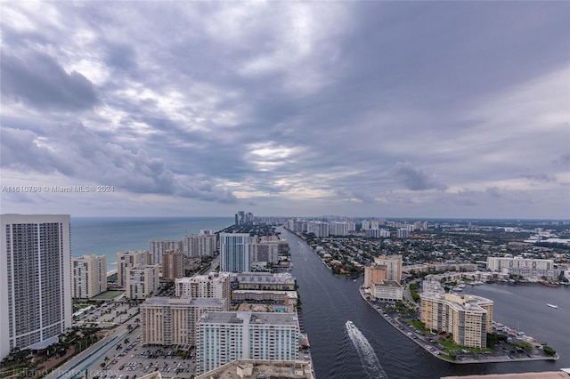 property's view of city featuring a water view