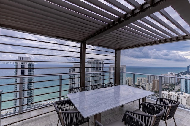 wooden terrace with a water view