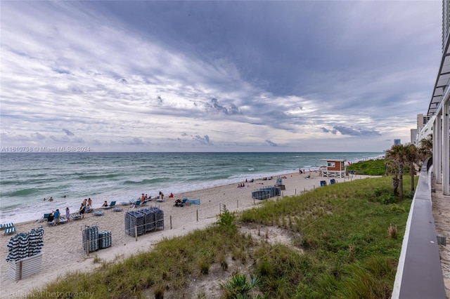 property view of water featuring a beach view