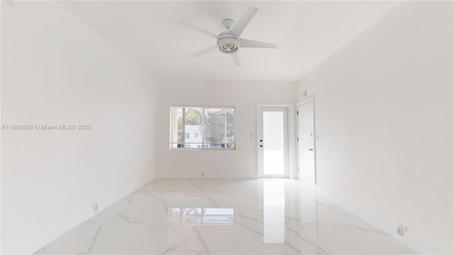 unfurnished room featuring ceiling fan