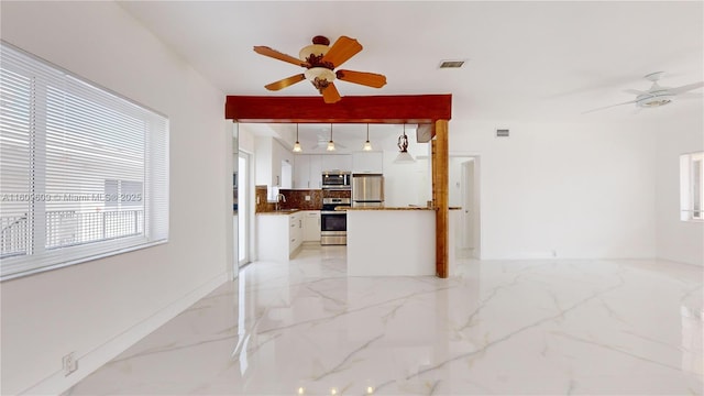 living room featuring sink and ceiling fan