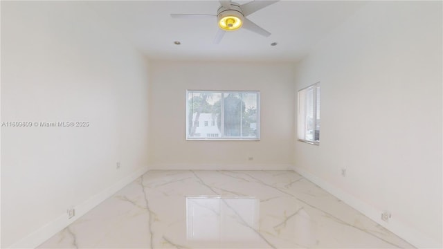 unfurnished room featuring ceiling fan