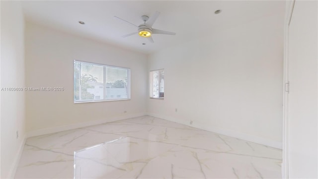 spare room featuring ceiling fan