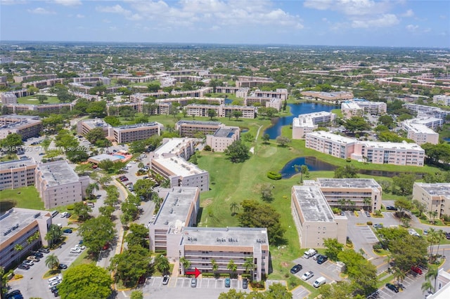 bird's eye view with a water view