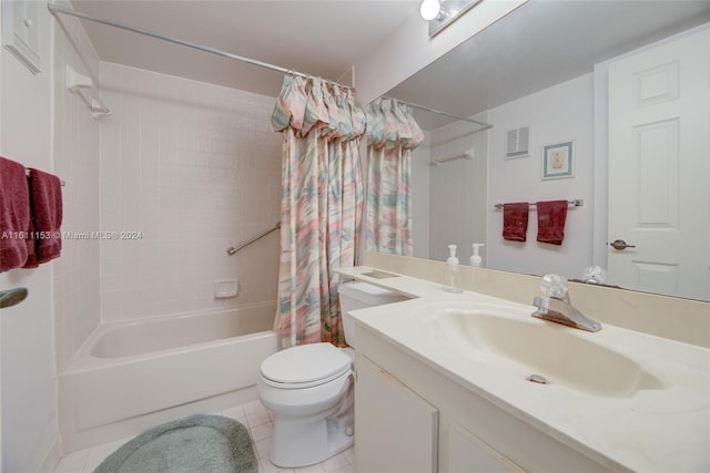 full bathroom with vanity, toilet, shower / bath combo, and tile patterned flooring