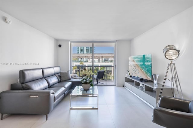 6039 Collins Ave Unit 734, Miami Beach, FL 33140 - living area featuring floor to ceiling windows