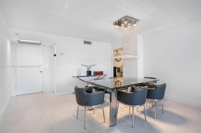 dining area featuring light tile patterned floors