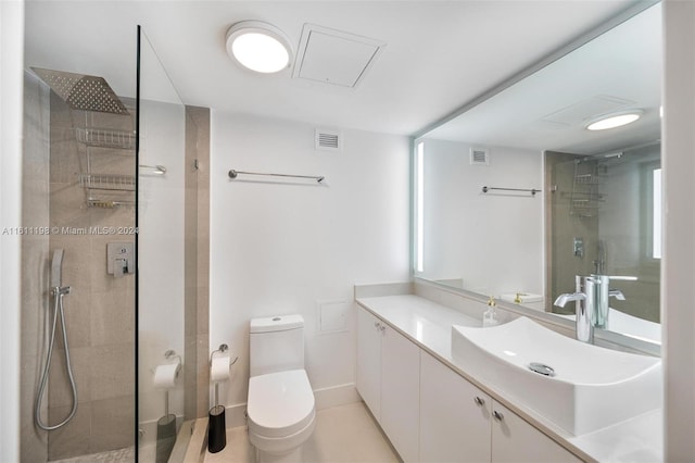 6039 Collins Ave Unit 734, Miami Beach, FL 33140 - full bath with vanity, a tile shower, toilet, and baseboards